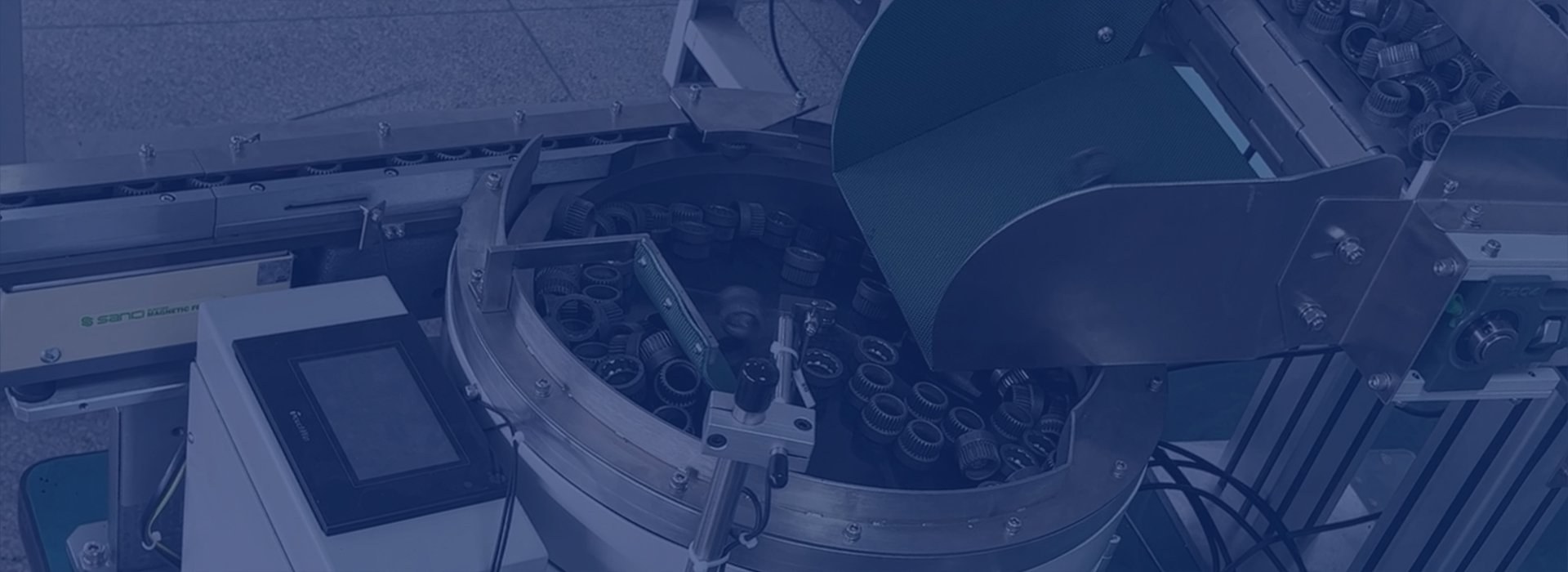 Centrifugal parts feeder running components on an industrial production line
